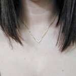 Collier Femme Acier inoxydable doré et Oxydes de zirconium ROBBEZ MASSON, porté